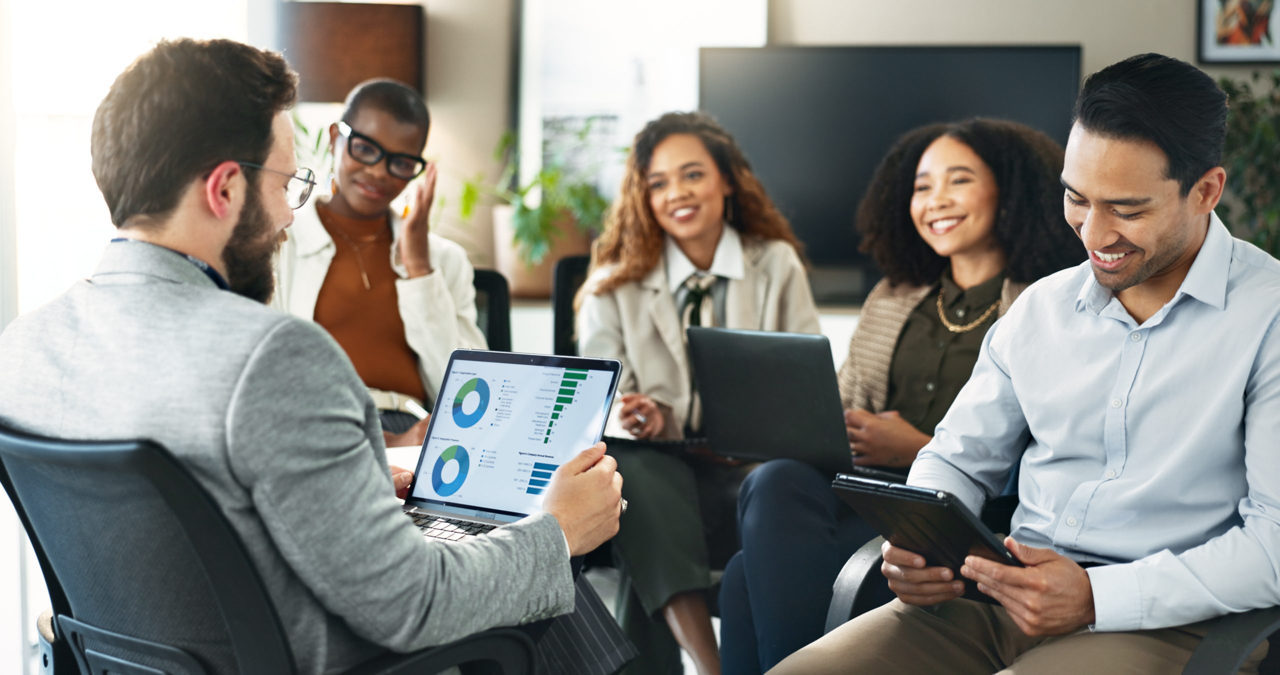 laptop-data-and-businessman-in-group-meeting-for-2025-04-06-11-14-49-utc